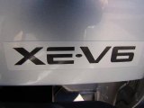 2003 Nissan Frontier XE V6 Crew Cab Marks and Logos