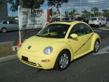 Yellow Volkswagen New Beetle in 2001