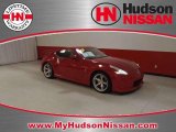 2010 Solid Red Nissan 370Z NISMO Coupe #39942944