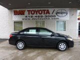 2010 Black Sand Pearl Toyota Corolla LE #40478956