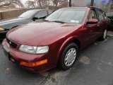 Ruby Red Pearl Nissan Maxima in 1995