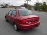 2001 Chevrolet Metro Sunset Red Metallic