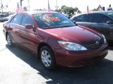 2004 Salsa Red Pearl Toyota Camry LE #40756779