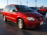 Inferno Red Tinted Pearl Dodge Caravan in 2003