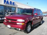 Sport Red Metallic Chevrolet Suburban in 2006