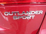 2011 Mitsubishi Outlander Sport ES Marks and Logos