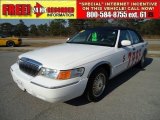 Vibrant White Mercury Grand Marquis in 1999