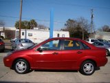 Sangria Red Metallic Ford Focus in 2003