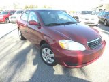 2005 Impulse Red Toyota Corolla LE #42873883