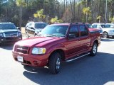 Red Fire Metallic Ford Explorer Sport Trac in 2004