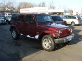 2009 Red Rock Crystal Pearl Jeep Wrangler Unlimited Sahara 4x4 #44511163