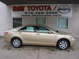 2011 Sandy Beach Metallic Toyota Camry LE #45394205