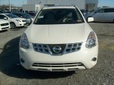 Pearl White Nissan Rogue in 2011