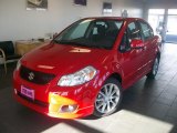 2009 Vivid Red Suzuki SX4 Touring Sport Sedan #46243744