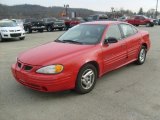 Bright Red Pontiac Grand Am in 2001