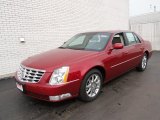 Crystal Red Tintcoat Cadillac DTS in 2011