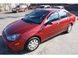 2004 Sangria Red Metallic Ford Focus SE Sedan #47157452