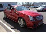 Crystal Red Tintcoat Cadillac CTS in 2010
