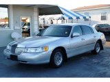 Silver Frost Metallic Lincoln Town Car in 1998