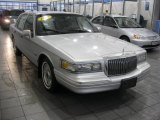 Silver Frost Pearl Metallic Lincoln Town Car in 1997