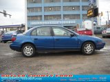 2002 Blue Saturn S Series SL Sedan #47539179