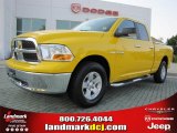 2009 Detonator Yellow Dodge Ram 1500 SLT Quad Cab #48193962