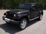 2011 Black Jeep Wrangler Unlimited Sahara 4x4 #48233737