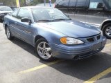 Medium Gulf Blue Metallic Pontiac Grand Am in 1999