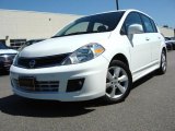 2010 Fresh Powder White Nissan Versa 1.8 SL Hatchback #48731649