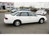 Performance White Ford Taurus in 1995