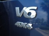 2002 Suzuki Grand Vitara JLX 4x4 Marks and Logos