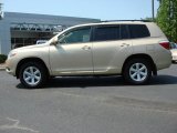 Sandy Beach Metallic Toyota Highlander in 2009