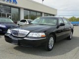 Black Lincoln Town Car in 2010