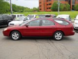 Matador Red Metallic Ford Taurus in 2002