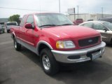 1997 Bright Red Ford F150 XLT Extended Cab 4x4 #50186255