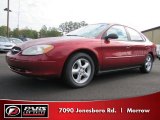 Toreador Red Metallic Ford Taurus in 2000