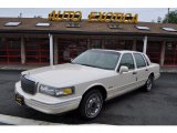 Ivory Metallic Lincoln Town Car in 1997