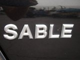 2009 Mercury Sable Sedan Marks and Logos