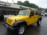 2011 Detonator Yellow Jeep Wrangler Unlimited Sport 4x4 #50912447