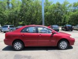 Impulse Red Toyota Corolla in 2004