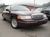 2002 Matador Red Metallic Ford Crown Victoria LX #51287681