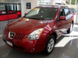 2009 Venom Red Nissan Rogue SL AWD #51724055