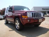 2009 Red Rock Crystal Pearl Jeep Commander Sport #52362203