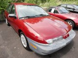 1999 Medium Red Saturn S Series SL1 Sedan #52396048