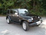 2010 Black Jeep Wrangler Unlimited Sahara #52818214
