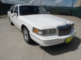 Performance White Lincoln Town Car in 1995