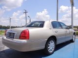 Light French Silk Metallic Lincoln Town Car in 2011