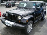 2011 Black Jeep Wrangler Unlimited Sahara 4x4 #53004993