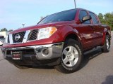 Red Brawn Nissan Frontier in 2006