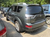 Manitoba Green Metallic Mitsubishi Outlander in 2009